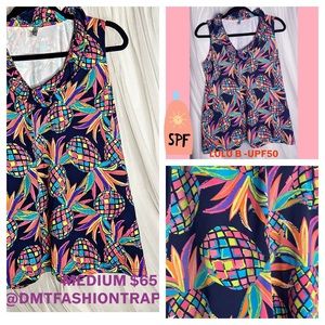 PINEAPPLE LuLuB UPF 50 sleeveless ruffle top . Size Medium. NWOT. Must have golf